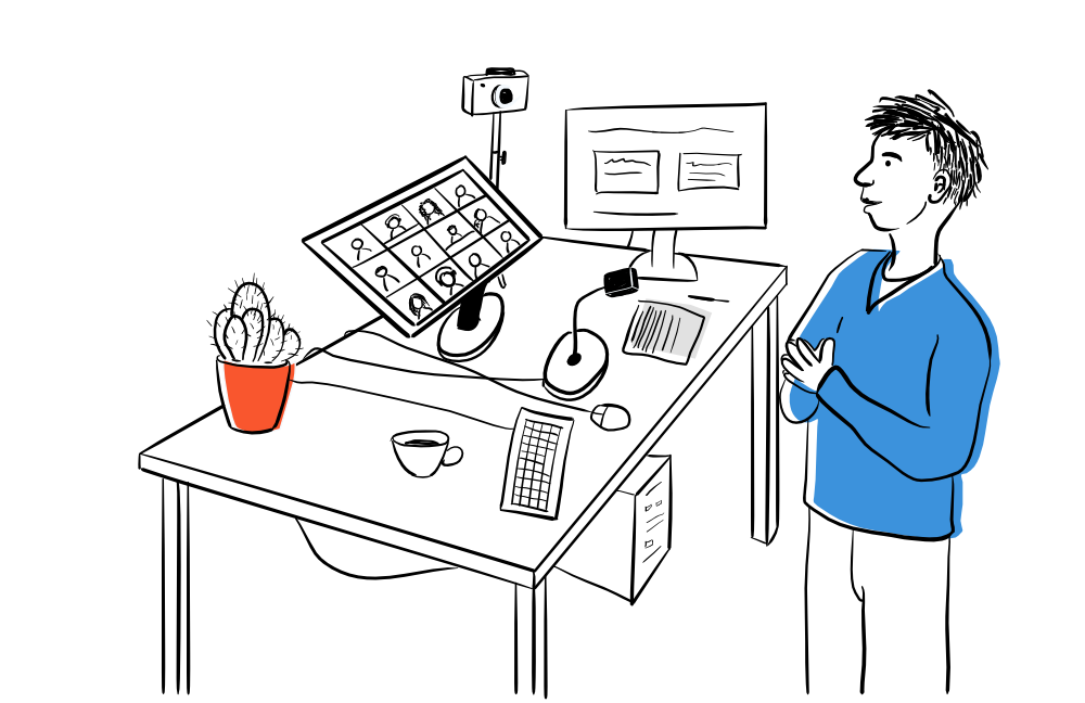 Vīrietis skatās uz monitoru un runā ar cilvēkiem